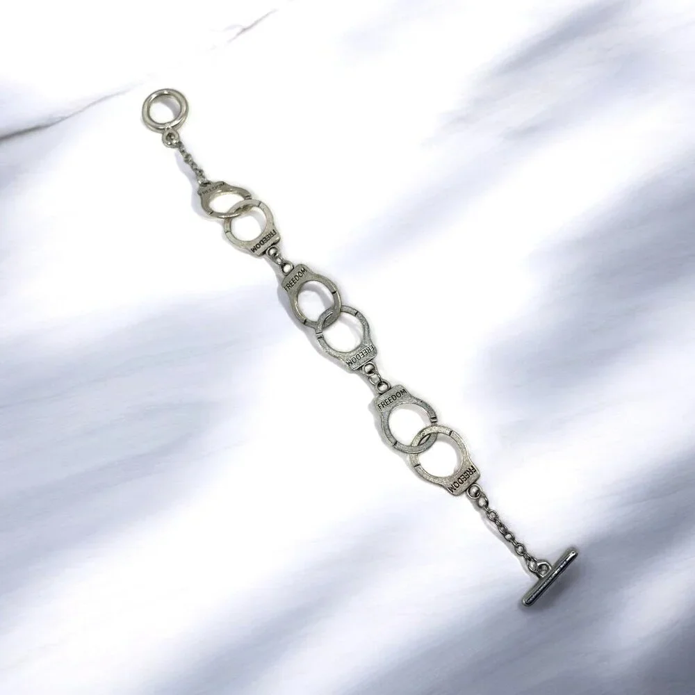 Silver Tone Handcuff Themed Freedom Charm Bracelet Toggle Clasp 8